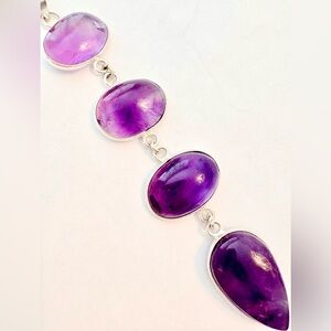 Large , natural 4 stone, 4 inch,  Amethyst pendant on a silver chain.